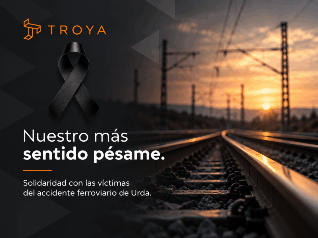 Comunicado oficial de Obras Troya en señal de condolencia por el accidente ferroviario de Urda (Toledo), con lazo negro y mensaje de solidaridad con las víctimas y profesionales del ferrocarril.